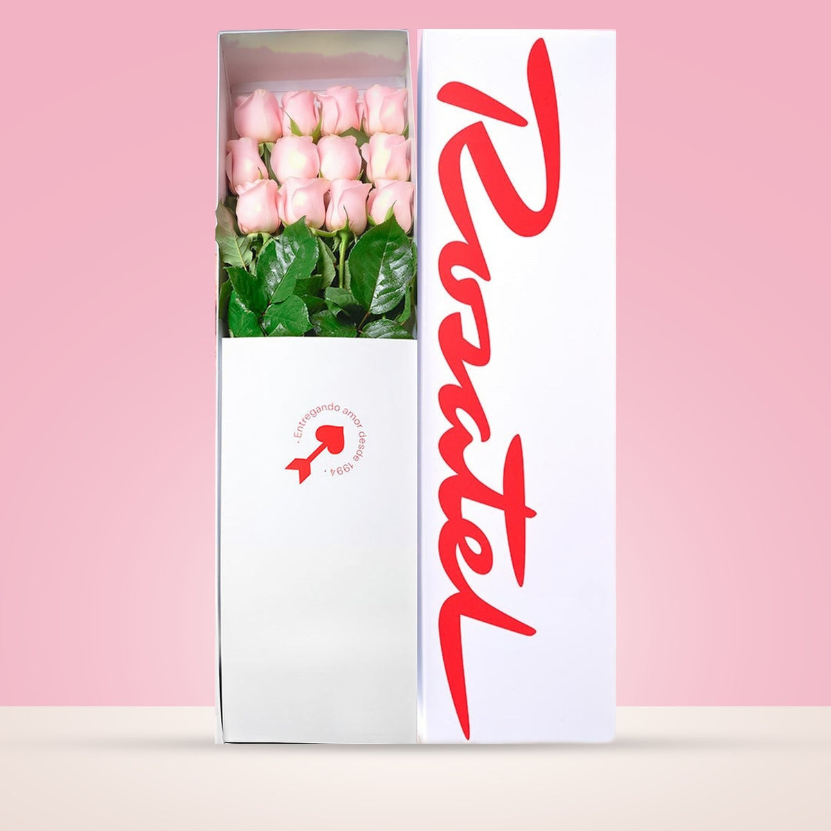 Caja blanca Rosatel con 12 rosas rosadas