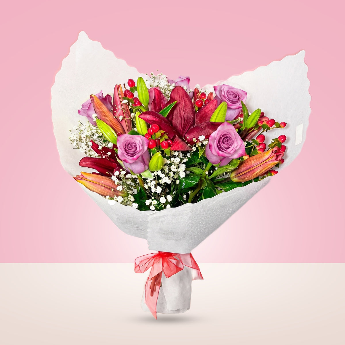 Ramo con 6 rosas lila y liliums