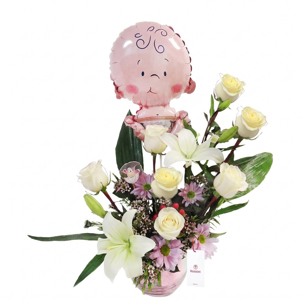 Arreglo con 7 rosas, liliums y globo niña en pecera mediana, rosas blancas