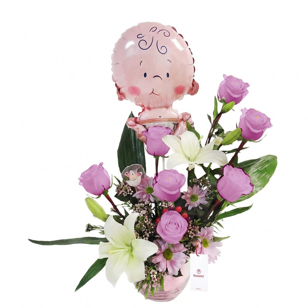 Arreglo con 7 rosas, liliums y globo niña en pecera mediana, rosas lila