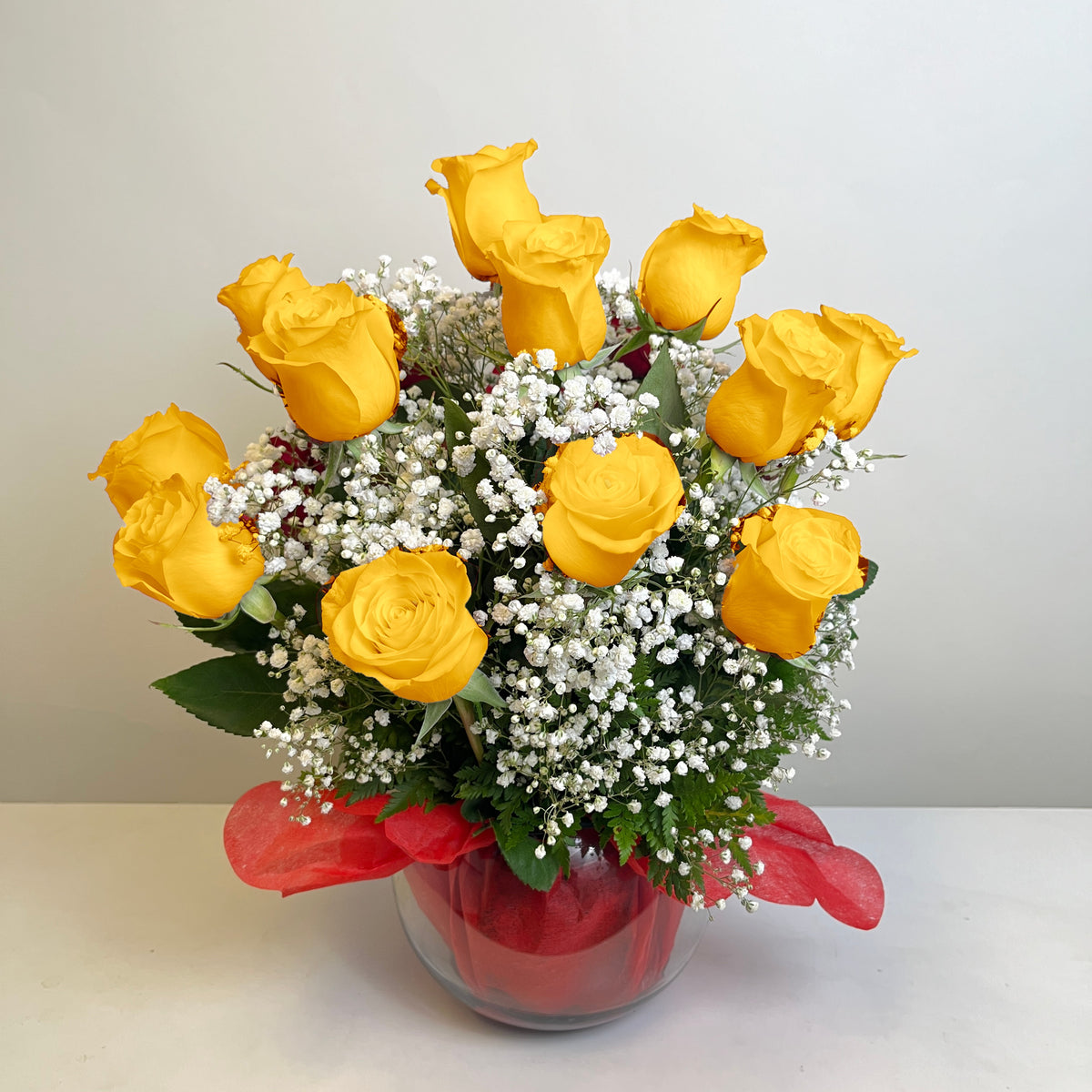 Arreglo de 20 rosas en pecera grande, rosas amarillas