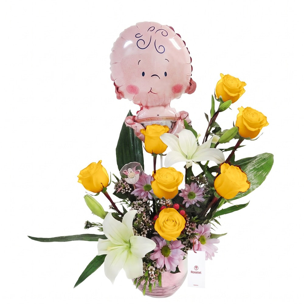 Arreglo con 7 rosas, liliums y globo niña en pecera mediana, rosas amarillas