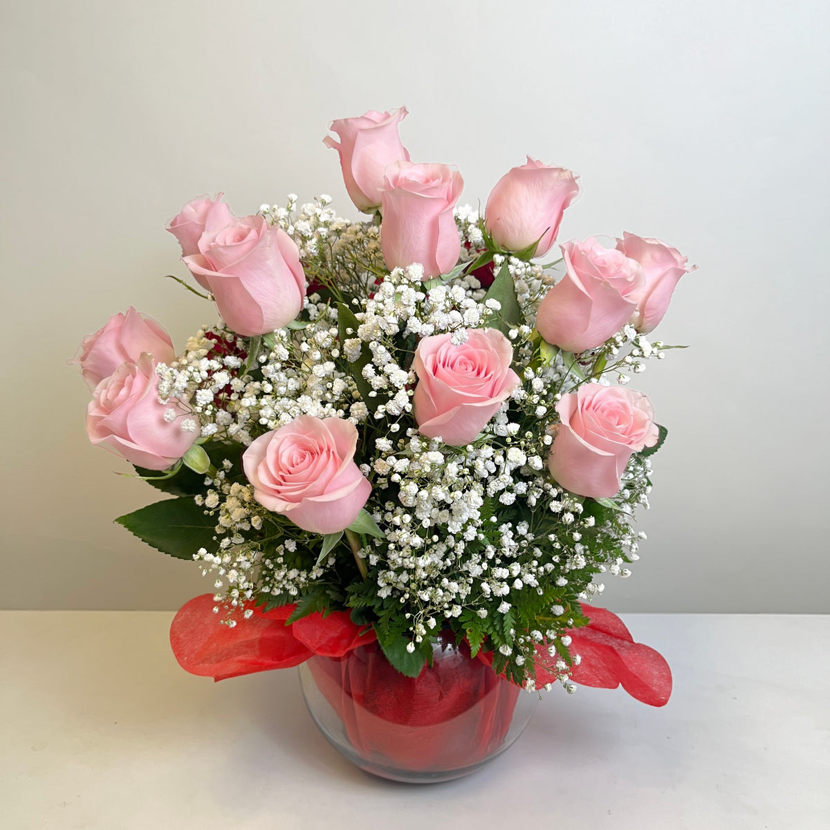 Arreglo de 20 rosas en pecera grande, rosas rosadas