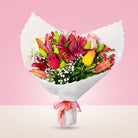 Ramo con 6 rosas variadas y liliums