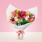 Ramo con 6 rosas rosadas y liliums