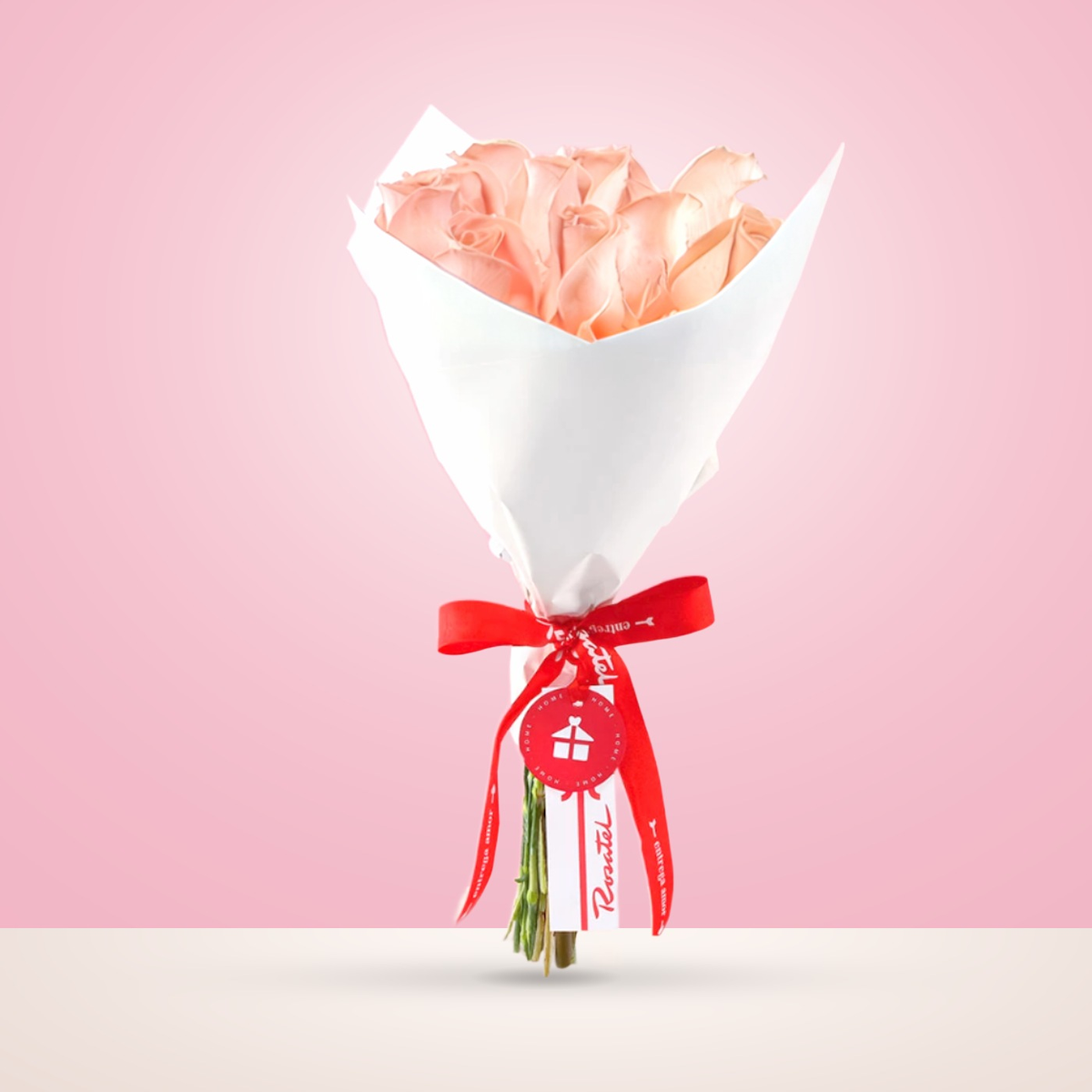 Ramo de rosas rosadas en papel coreano