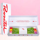Caja blanca Rosatel con 12 tulipanes de colores variados