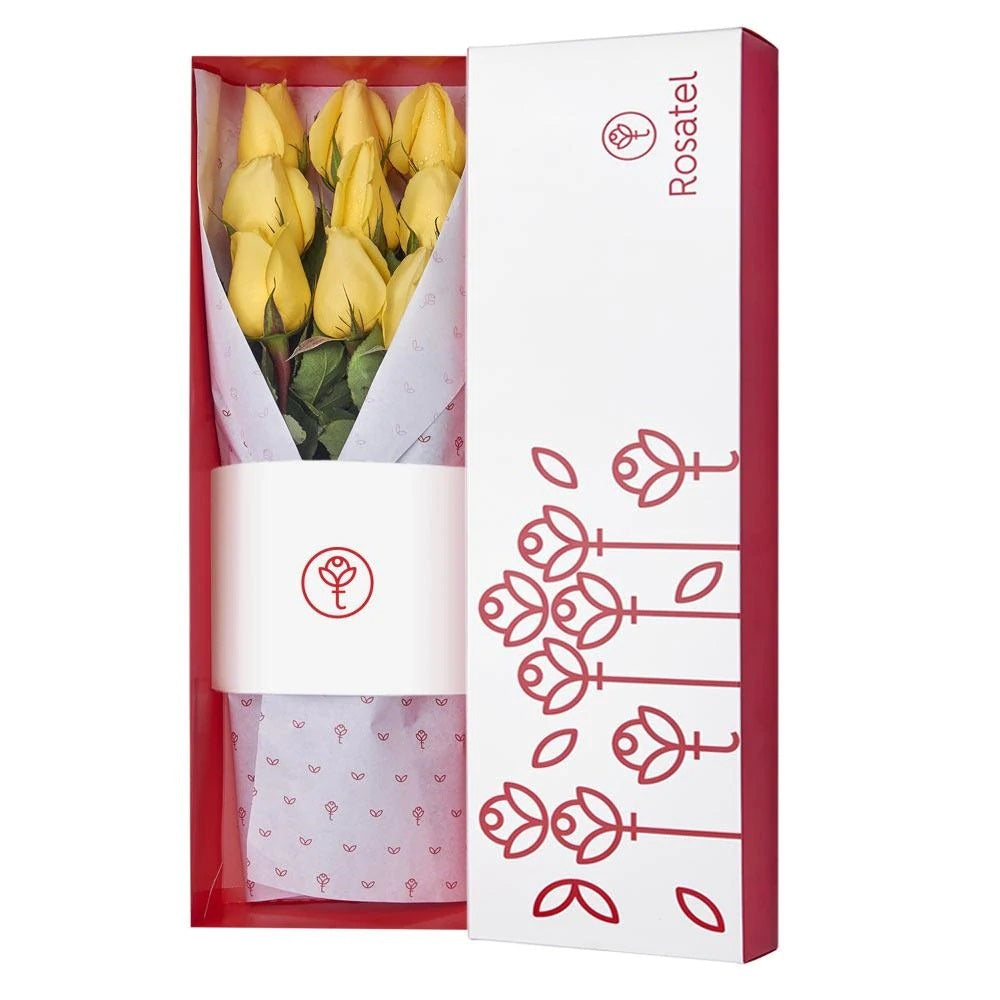 caja blanca con 9 rosas amarillas