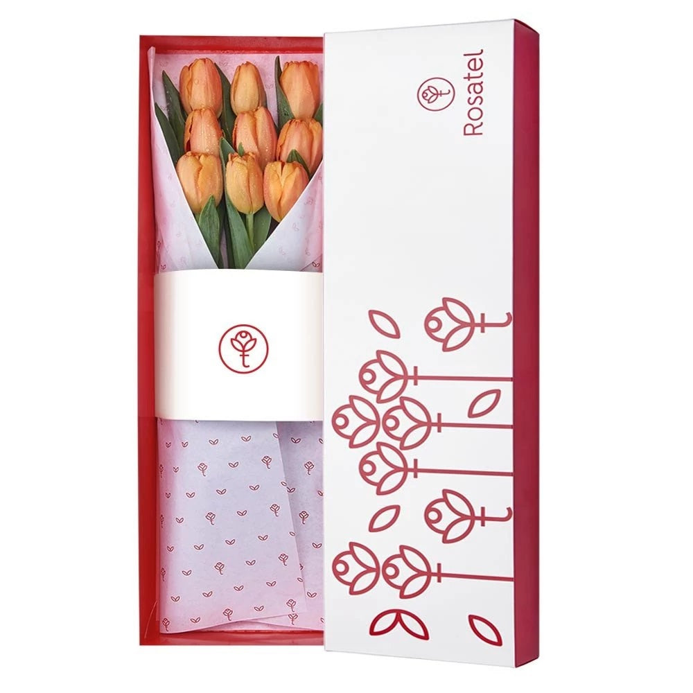 Caja blanca con 9 tulipanes naranja