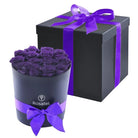Sombrerera negra grande 14 rosas preservadas purpura y caja negra
